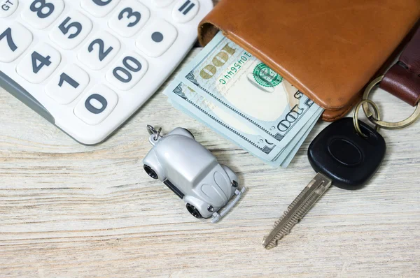 Car toy with key and money — Stock Photo, Image
