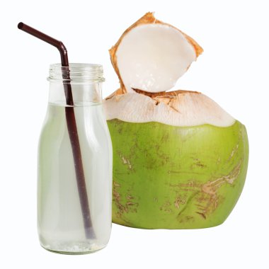 Coconut water in glass bottle isolated on white clipart