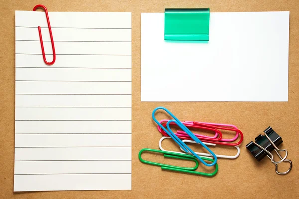 Business card and note with paperclips — Stock Photo, Image