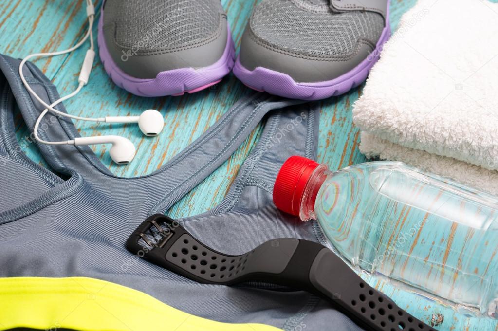 Workout set with sport clothing and heart rate monitor