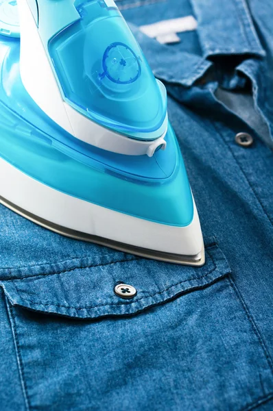 Ironing denim shirt — Stock Photo, Image