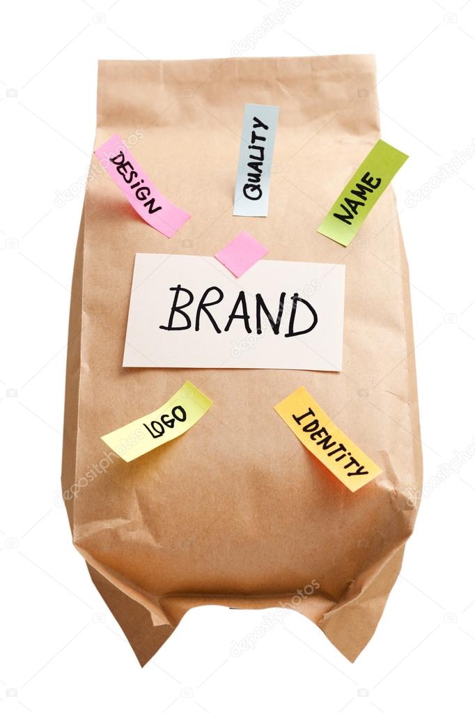 Paper bag with branding marketing concept isolated on white