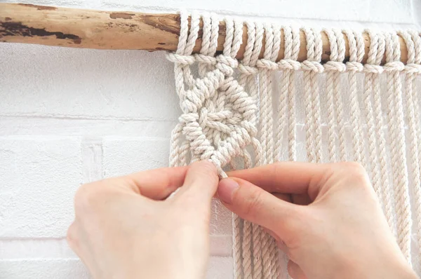 Woman Knits Weaving Macrame Pinned Wooden Stick White Brick Wall — Stock Photo, Image