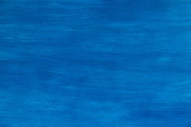 Açık mavi soyut arkaplan. Kağıt üzerine bıyıkla boyanmış parlak mavi arkaplan. Arka plan, kopyalama alanı. Sanatsal olarak bulanık. Kağıt dokusu