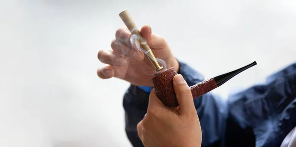 Close Man Burning His Pipe Isolated Backgroun — Stock Photo, Image