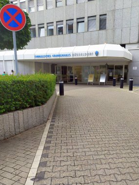 Dusseldorf, North Rhine-Westphalia, Germany, July 10, 2021: Entrance of Evangelisches Krankenhaus Dsseldorf (EVK) for medical surgery and covid treatment with professional therapy and vaccine science