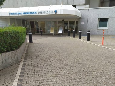Dusseldorf, North Rhine-Westphalia, Germany, July 10, 2021: Entrance of Evangelisches Krankenhaus Dsseldorf (EVK) for medical surgery and covid treatment with professional therapy and vaccine science