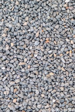 Ham kaya ve mineraller doğal taşlardır. Sert bir sahil veya kayalık plajda ezilmiş ve pürüzlü malzemelerle doğal mineral arkaplan olarak harmonik pastel renklerde külçeler ve kumtaşları gösterirler.