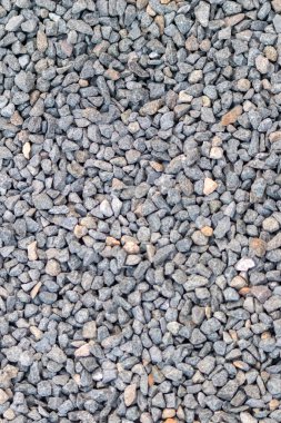 Ham kaya ve mineraller doğal taşlardır. Sert bir sahil veya kayalık plajda ezilmiş ve pürüzlü malzemelerle doğal mineral arkaplan olarak harmonik pastel renklerde külçeler ve kumtaşları gösterirler.