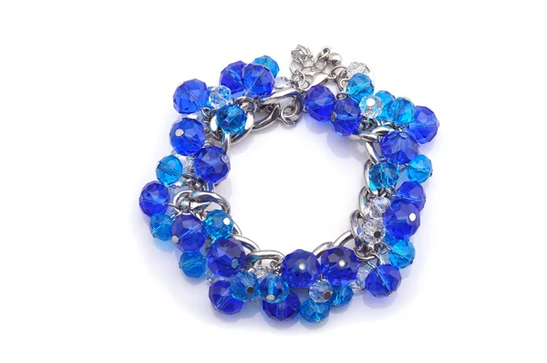 Bracelet bleu sur fond blanc — Photo