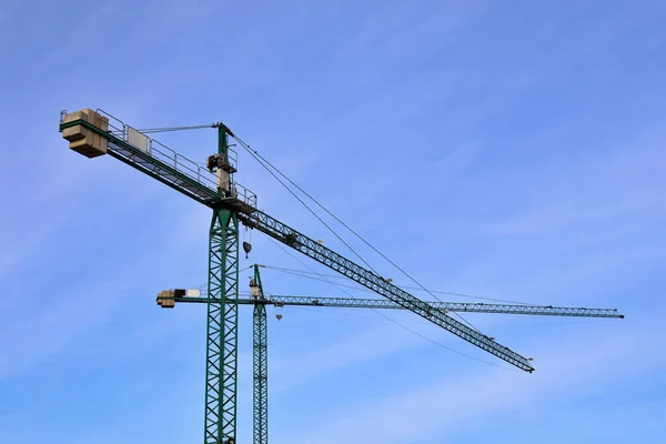 Construction cranes Real estate and construction of new homes. Economic recovery.
