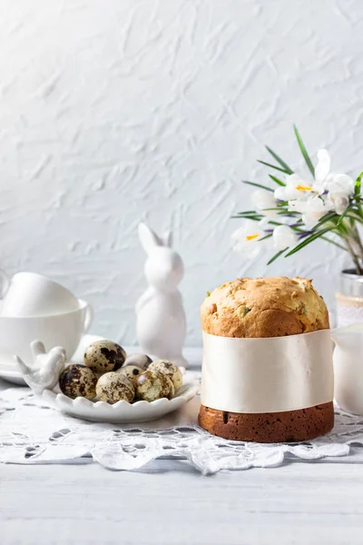 Easter  sweet bread, kulich (cake), quail eggs with white crocuses. Holidays breakfast .