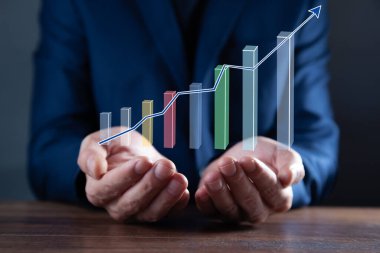 Ekranda işadamı eli grafiği