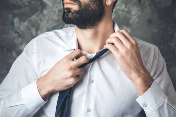 Business Man Remove Tie Dark Background — 스톡 사진