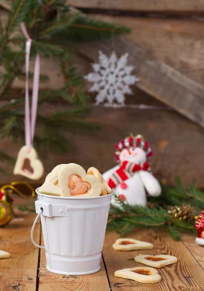 Stained glass cookies on Christmas decoration background — Stock Photo, Image