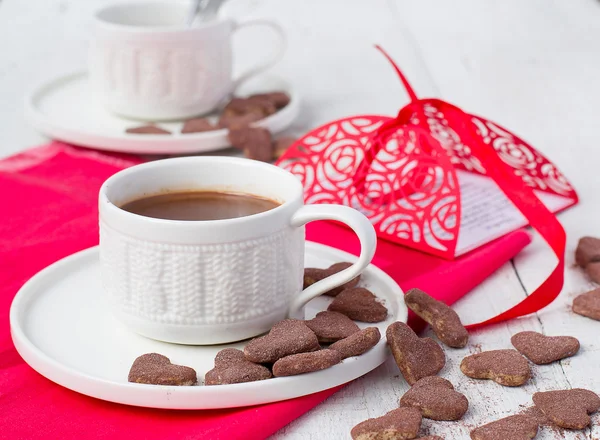 Hot cocoa and cookies hearts. Selective focus — Stock Photo, Image