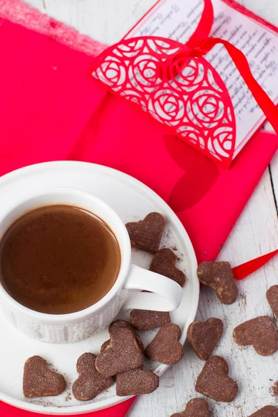 Hot cocoa and cookies hearts. Selective focus — Stock Photo, Image