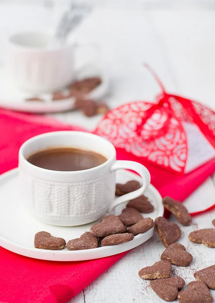 Hot cocoa and cookies hearts. Selective focus — Stock Photo, Image