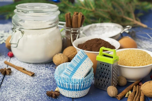 Ingredients for baking Christmas muffins on wooden background. s — Stock Photo, Image