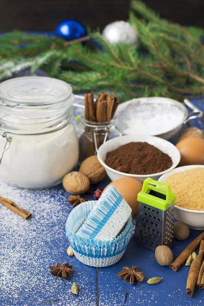 Ingredients for baking Christmas muffins on wooden background. s — Stock Photo, Image