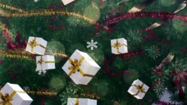 Yeni yıl ve Noel geçmişi. Kusursuz döngü video animasyonu. Noel ağacı ve kar taneleri düşen Mutlu Noeller mektuplarının şirin animasyonu. Mutlu noeller ve yılbaşı hediyeleri
