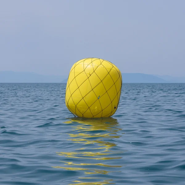 Boya amarilla para regata Imagen de stock