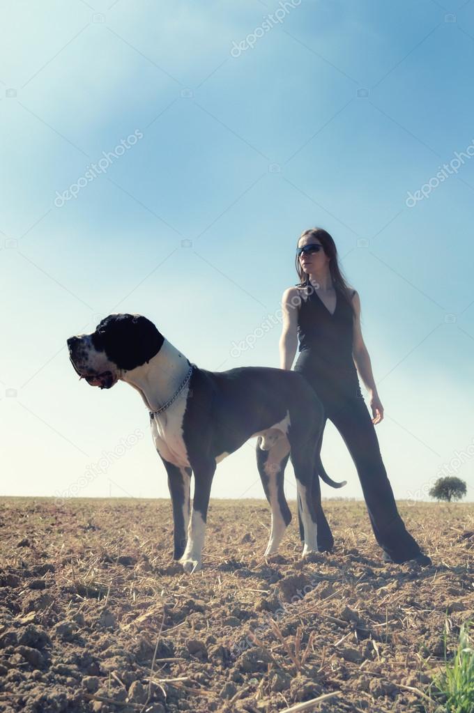 Young woman and big dog