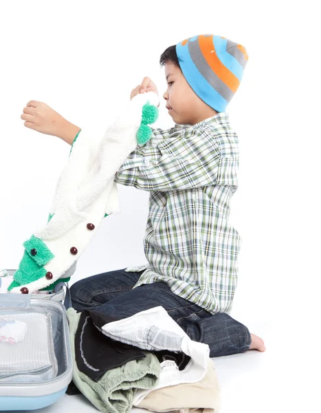 Boy with a suitcase is standing — Stock Photo, Image