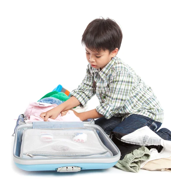 Boy with a suitcase is standing — Stock Photo, Image