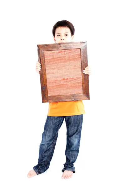 Boy holding picture frame — Stock Photo, Image