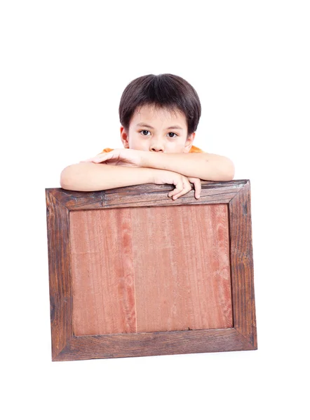 Мальчик держит рамку — стоковое фото