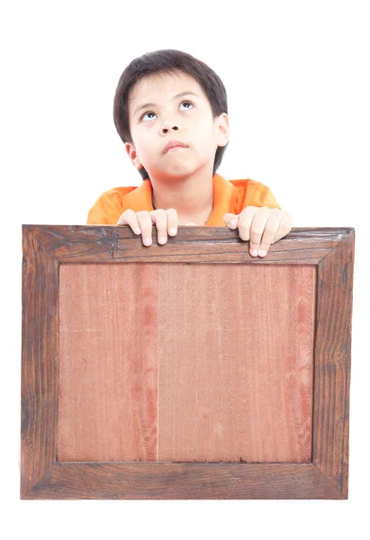 Boy holding picture frame — Stock Photo, Image