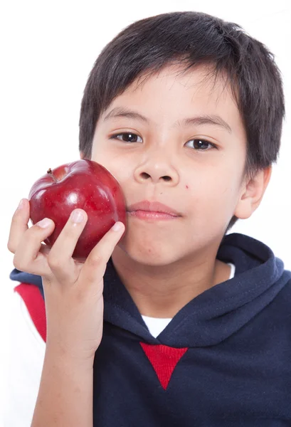 Junge mit Apfel in der Hand — Stockfoto