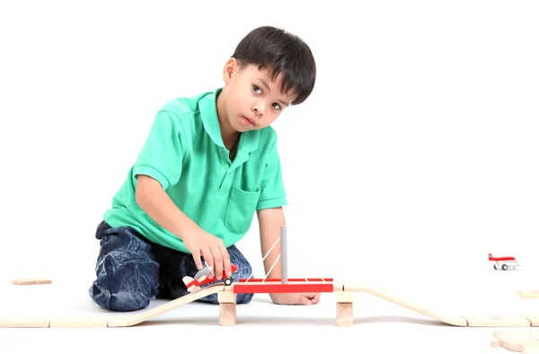 Boy building  with colorful wooden blocks — Stock Photo, Image