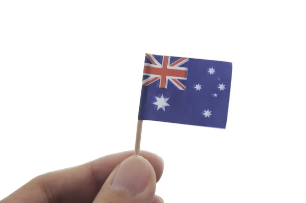 Μίνι αυστραλιανή εθνική σημαία κρατώντας από τα δάχτυλα — Φωτογραφία Αρχείου