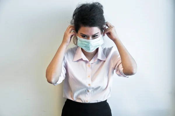 Business woman wear hygiene mask and sick