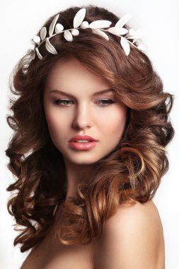 Portrait of a beautiful fashion bride,sweet and sensual.Wedding make up and hair.glamor closeup portrait of sexy stylish young woman model with bright makeup, with glossy lips,with perfect clean skin