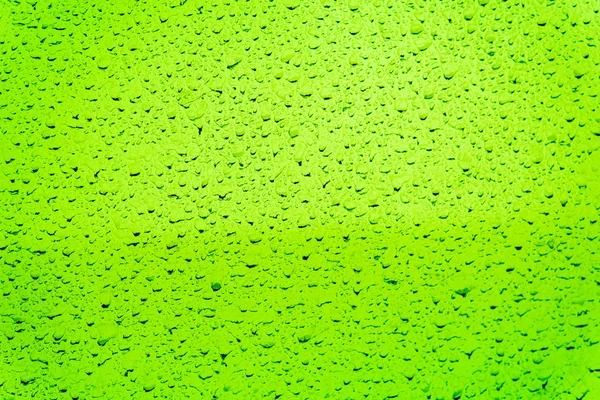 Splatter lama fundo verde . — Fotografia de Stock