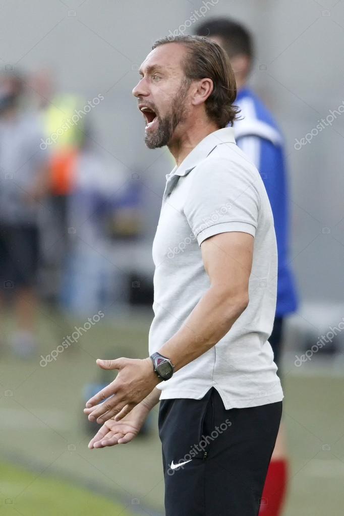 BUDAPEST, HUNGARY - JULY 24, 2014: Head Coach Of FTC, Thomas Doll During Ferencvarosi  TC Vs. HNK Rijeka UEFA EL Football Match At Puskas Stadium On July 24, 2014  In Budapest, Hungary.