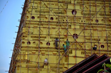 Tay insanlar Chedi Buddhakhaya yenilemek 
