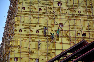 Tay insanlar Chedi Buddhakhaya yenilemek