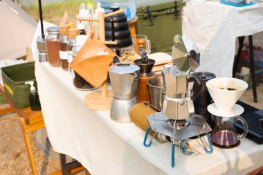 Tools equipment and material for thai men barista people use drip coffee maker or dripper made hot and iced coffee and tea for sale at outdoor of cafe shop at Bangbuathong city in Nonthaburi, Thailand