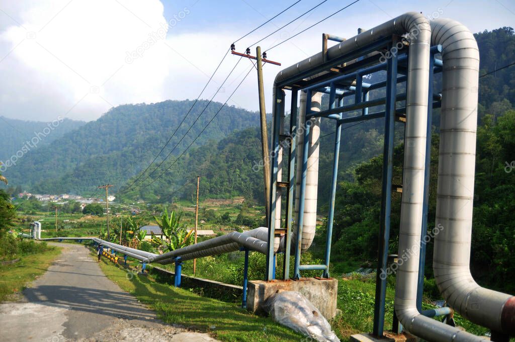 View landscape mountain and water and gas pipe line transfer to Raja Berneh city valley village hill for indonesian use in Sibayak mount of Karo at Sumatera Utara or North Sumatra, Indonesia