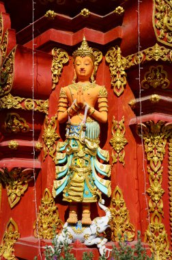 Wat Ming Mueang Chiang Rai, Tayland, cephesinde melek heykel