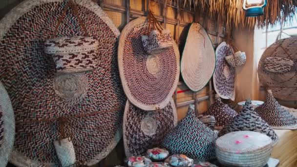 Weaved Mats Baskets Bags Made Dried Palm Leaves Panning Shot — Stock Video