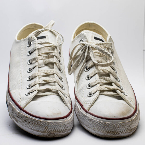 old and worn-out sneakers