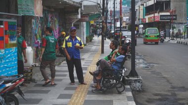 The activities of people on the streets of the city of Bogor, Indonesia.