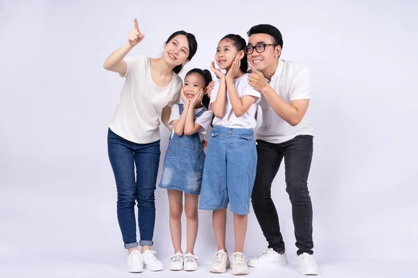 Portrait of Asian family on white background
