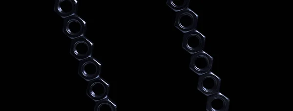 screw-nuts on a black background