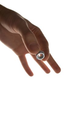 screw-nut in hands on a white background